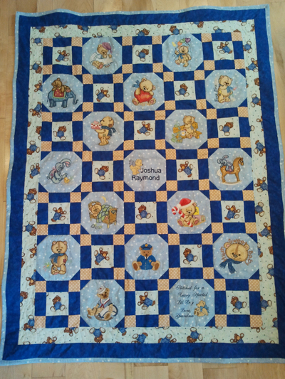 Joshua quilt with Qld Toys embroidery